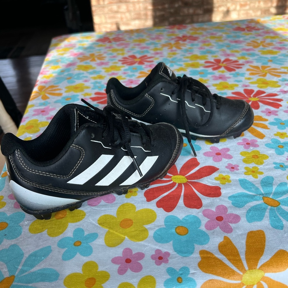 Little boys Adidas baseball cleats